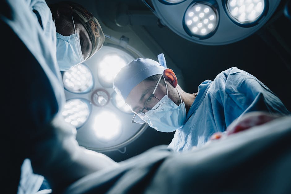 surgeons performing a procedure in a state of the art operat