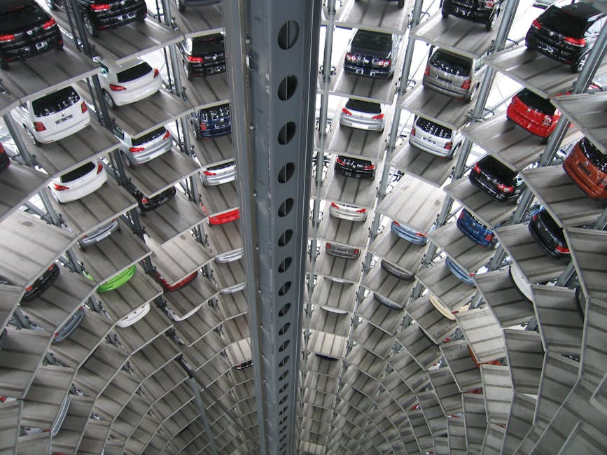 a vertical view of a spiral multi storey car park filled wit